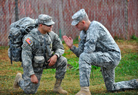 SFC Marlow preps SPC Rodriguez for the ruck march